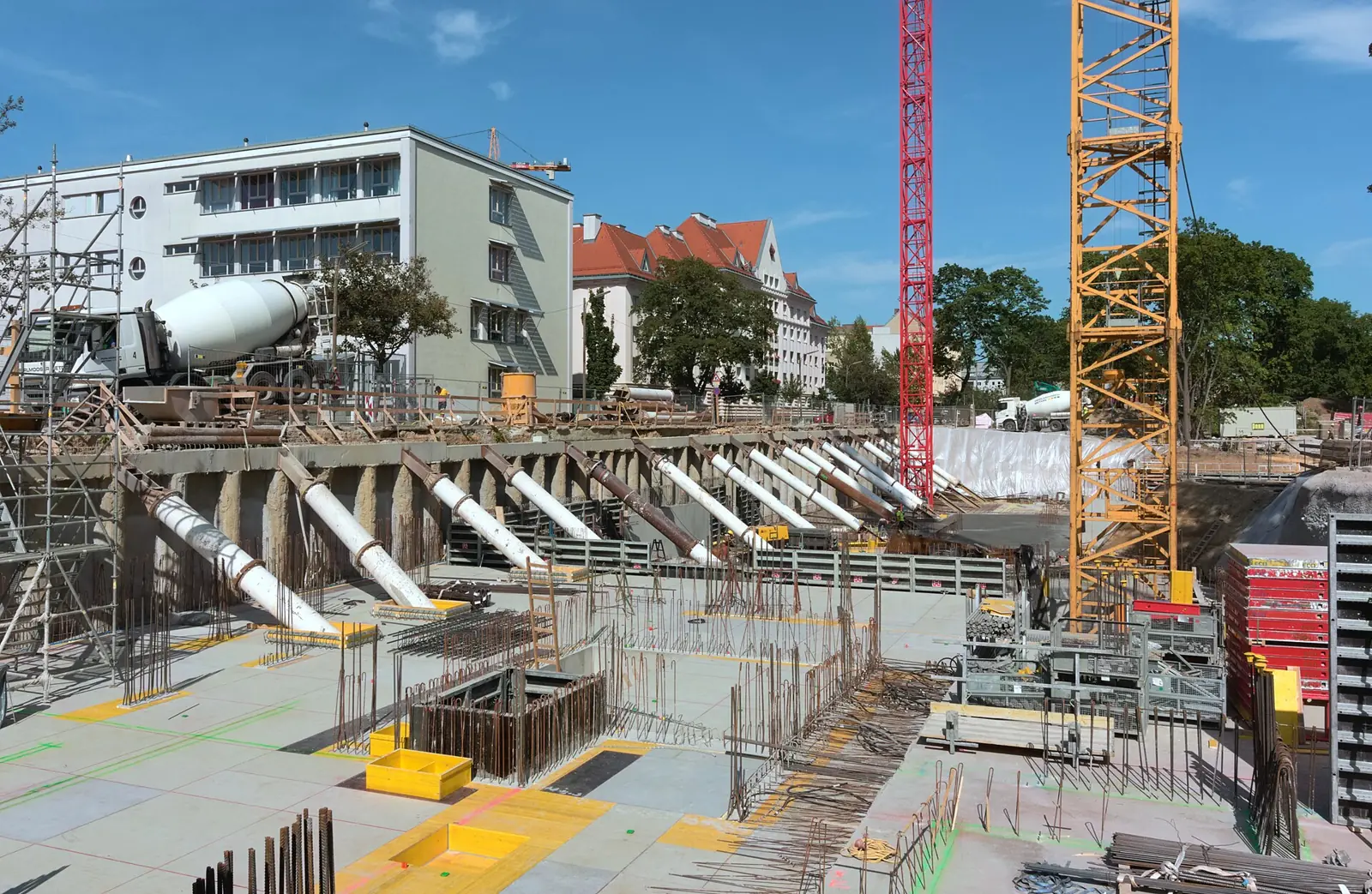 Concrete foundations and columns at a Vienna construction site.