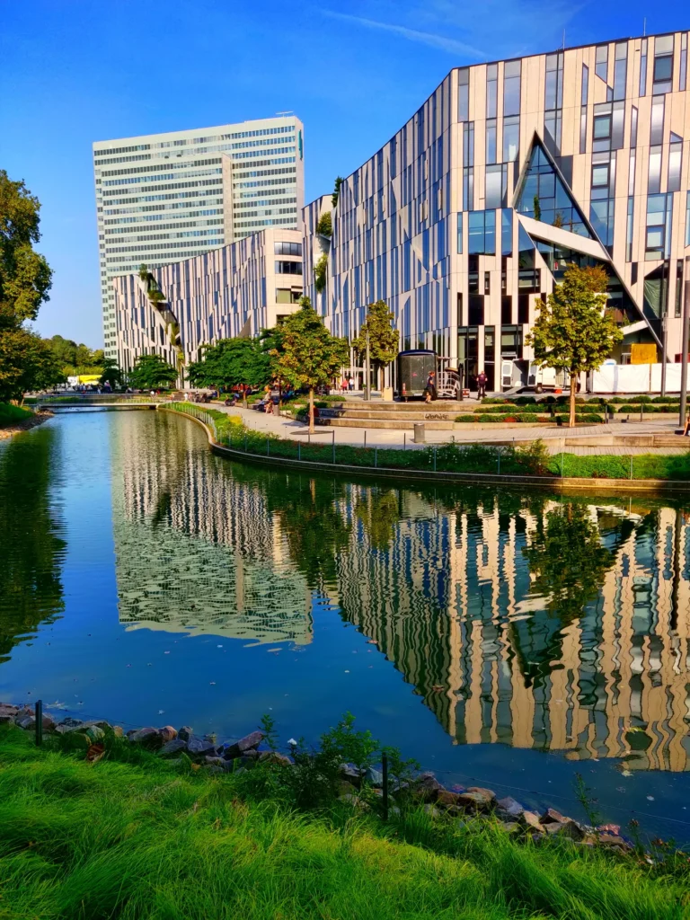 Completed Ko-Bogen offices reflected in water.